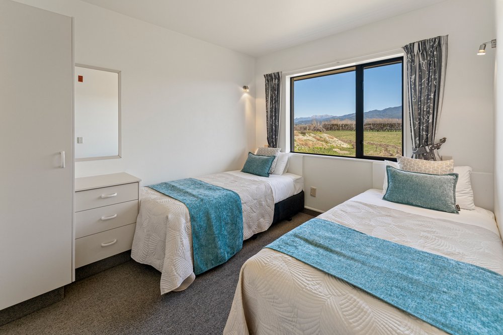 Twin bedroom in two bedroom family motel accommodation
